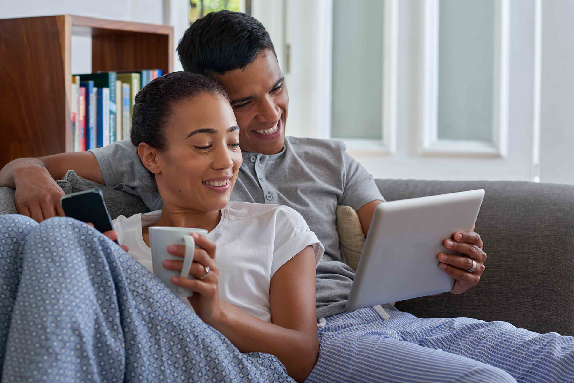 couple consulting tablet